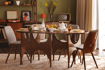 A small dining room with custom furniture.